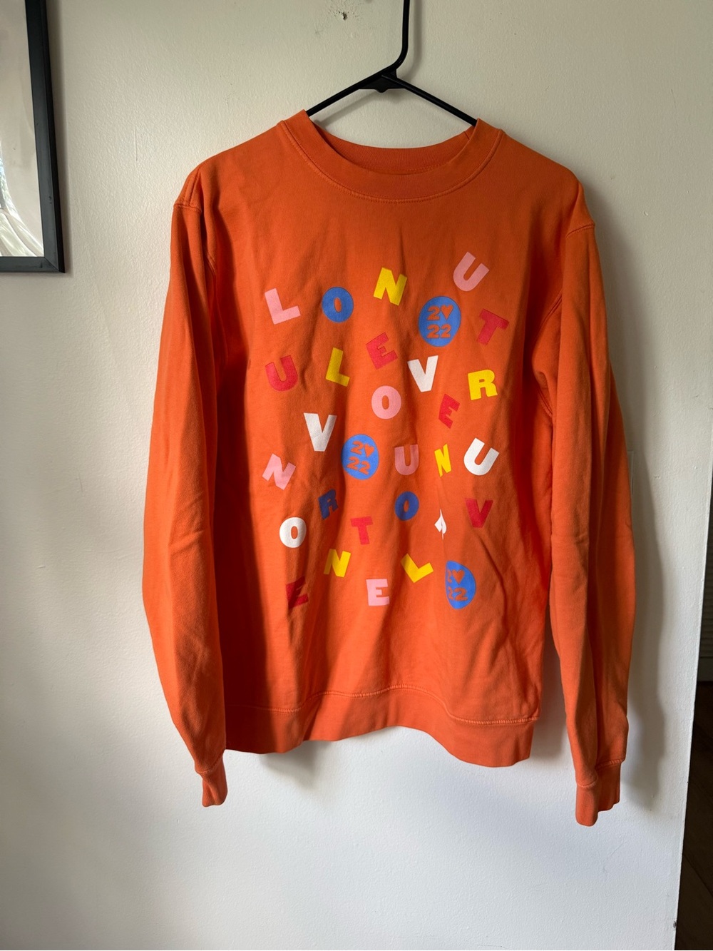 Men's Orange Graphic Crewneck Sweatshirt with Multicolor Lettering